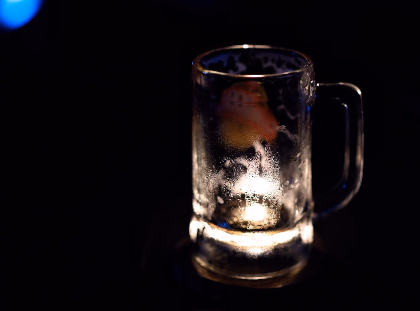 Beer mug in candlelight