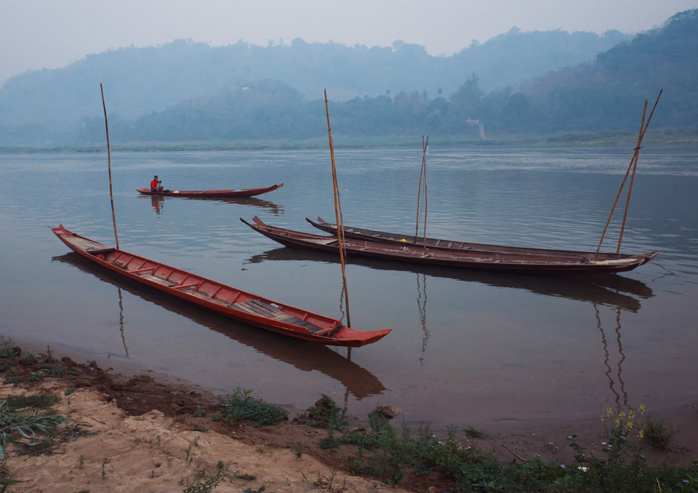 Boats on the Mekong River near Luang Prabang, Laos