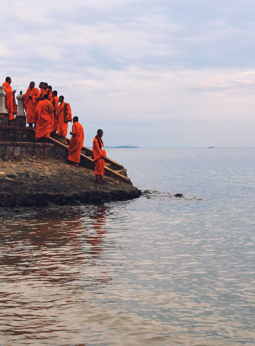 Buddhist novices at the shore in Cambodia