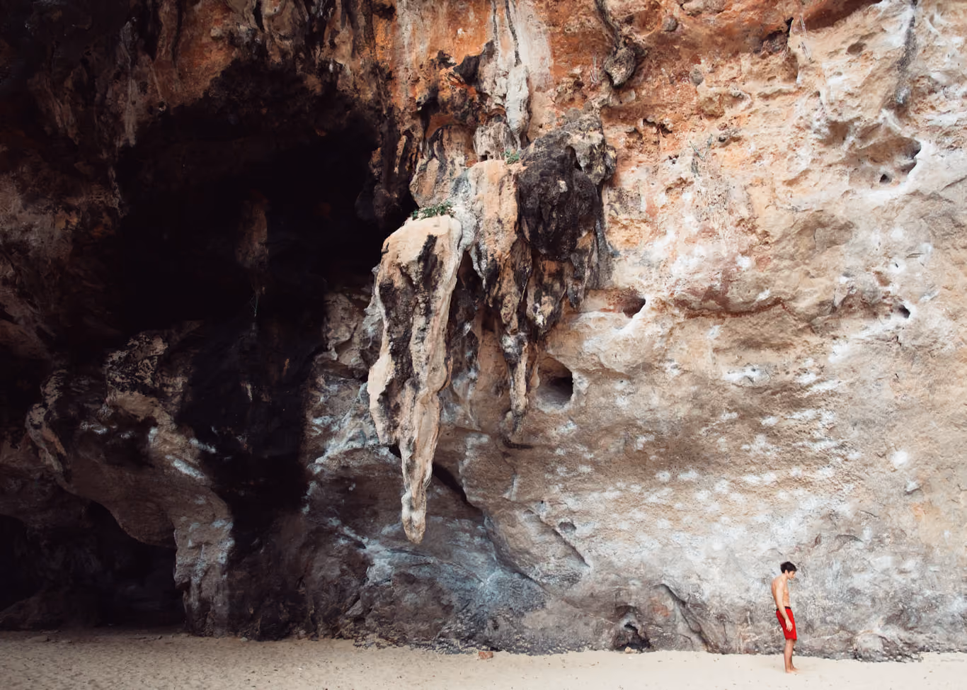 Climber lost in thought near the beach in Thailand