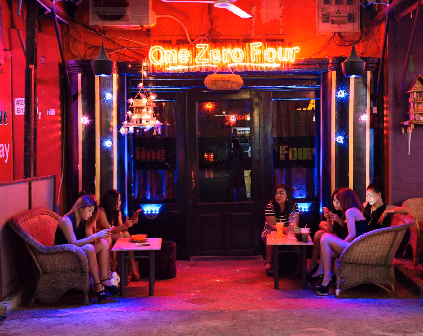 Ladies taking a break from bar work in Phnom Penh