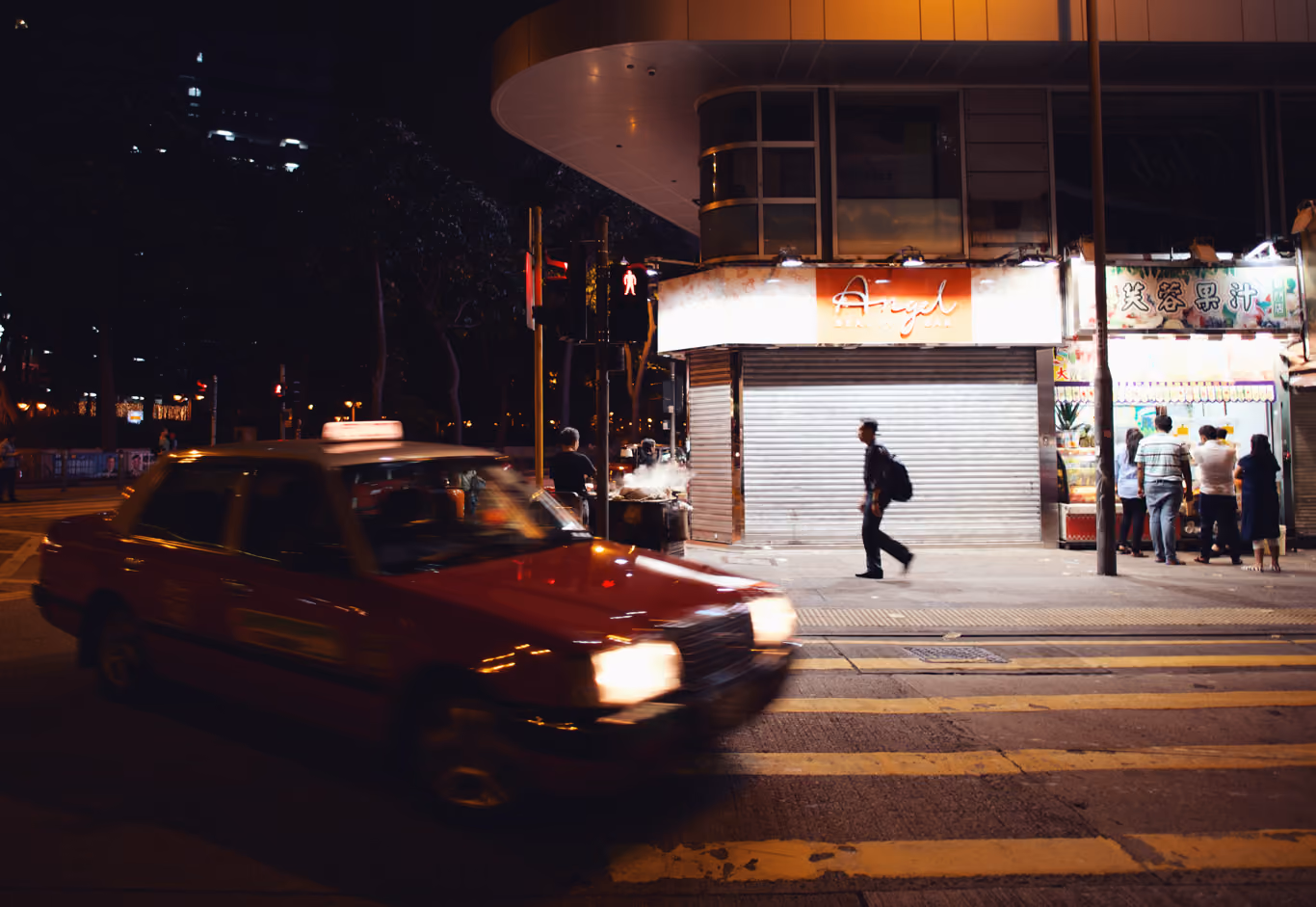 Man and taxi street scene in Hong Kong