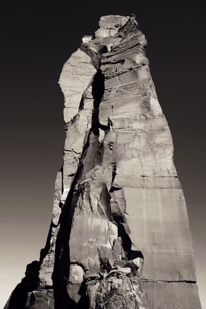 Rock climbers on Fine Jade in Moab, Utah
